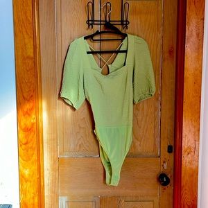 Lulus Everywhere You Go lime green puffed-sleeved, lace-up bodysuit
